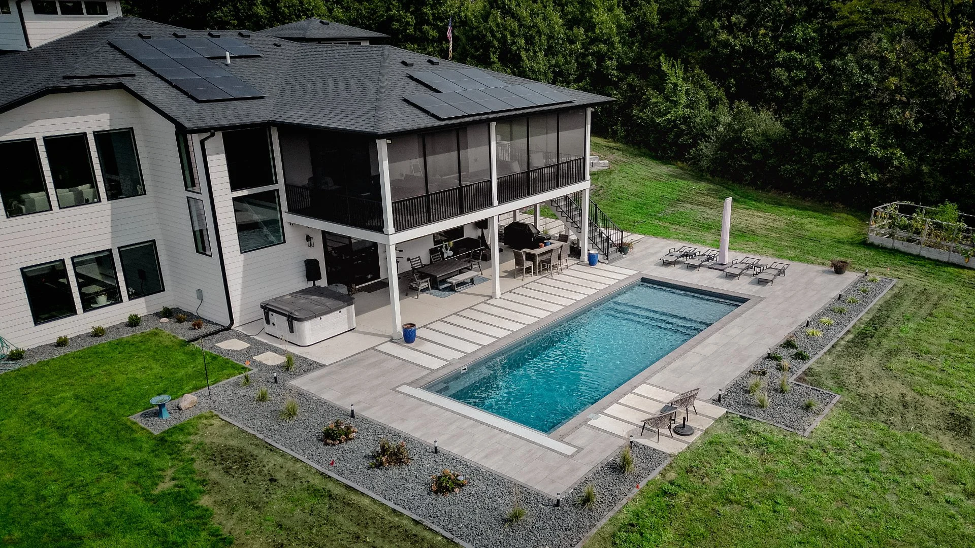 Modern house with pool and lounge area in Ankeny, IA