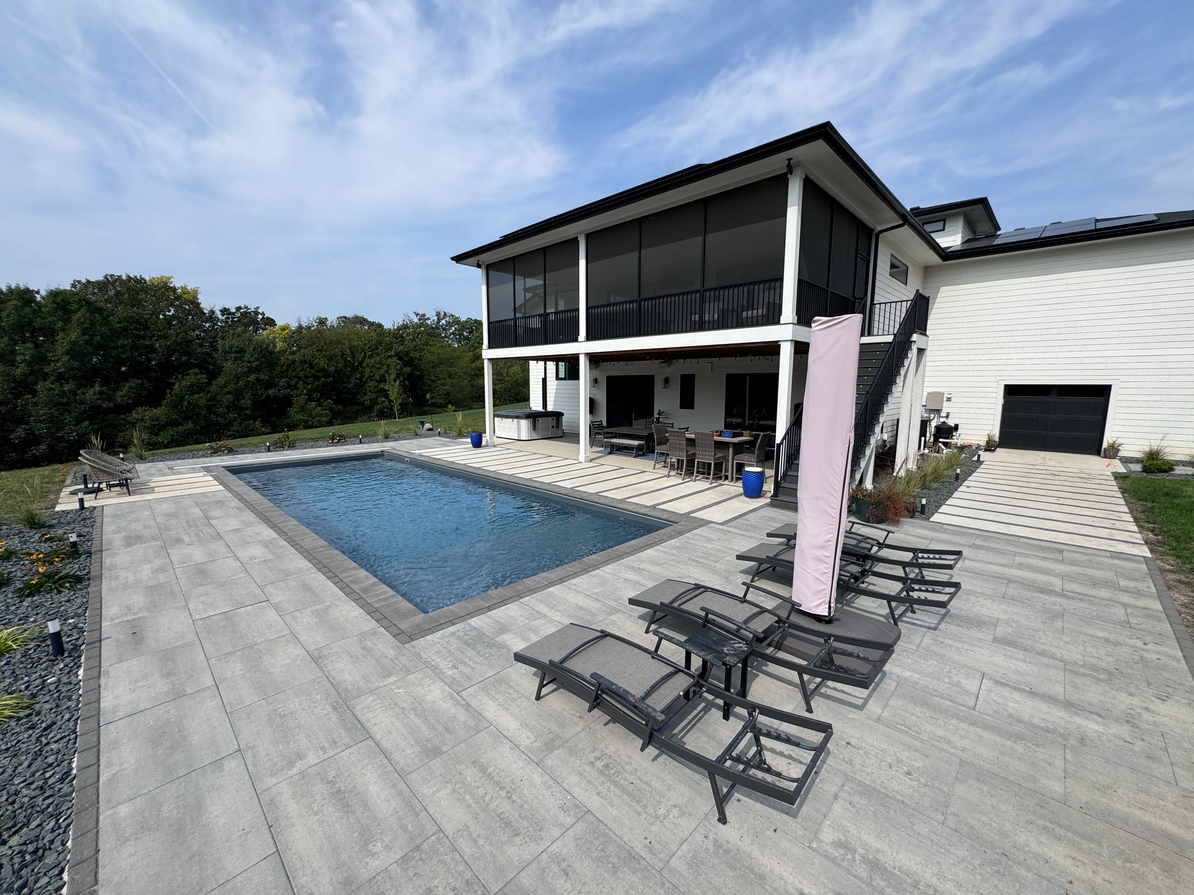 Modern house with pool and lounge area in Ankeny, IA