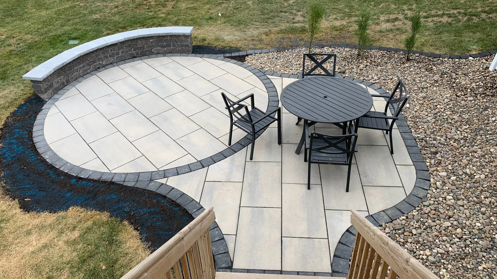 Patio, Seating Wall, & Landscape Bed Install in Urbandale, IA