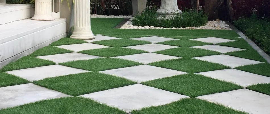 Artificial turf used as an accent on an outdoor space in Ankeny, IA.