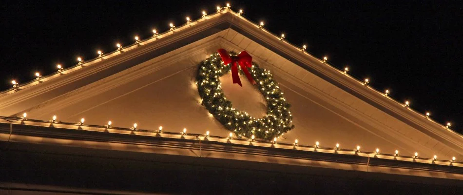 Christmas lights and a wreath on a house in Ankeny, IA.