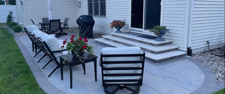 Patio area with outdoor steps and furniture in Urbandale, IA.