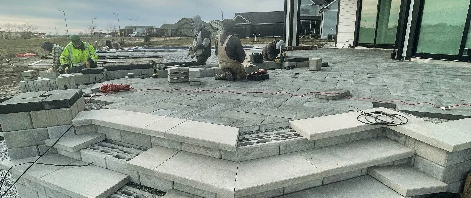 A patio being installed on a property in Ankeny, IA.